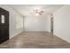 Spacious living room featuring a ceiling fan and tiled floors at 2808 W Lawrence Rd, Phoenix, AZ 85017