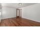 Bright living room featuring wood floors and a glass panel door at 2808 W Lawrence Rd, Phoenix, AZ 85017
