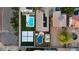 Aerial view of a home with a pool, outdoor kitchen and solar panels at 2810 N 112Th Ln, Avondale, AZ 85392