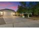 Well-maintained home with a spacious driveway and a two-car garage at 2810 N 112Th Ln, Avondale, AZ 85392