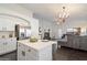 Bright, updated kitchen has stainless appliances and a view to the living room at 2810 N 112Th Ln, Avondale, AZ 85392
