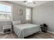Cozy bedroom featuring neutral walls, a comfy bed, and natural light from shuttered windows at 2821 S Skyline -- # 135, Mesa, AZ 85212