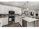 Well-lit kitchen with white cabinets, stainless steel appliances, and decorative backsplash at 2821 S Skyline -- # 135, Mesa, AZ 85212