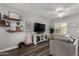 Cozy living room showcasing a modern entertainment center, stylish decor, and comfortable seating area at 2821 S Skyline -- # 135, Mesa, AZ 85212