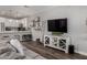 Modern living room open to the kitchen, features stylish decor, and ample space for relaxation and entertainment at 2821 S Skyline -- # 135, Mesa, AZ 85212