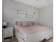 Bedroom with neutral decor, decorative pillows, and soft, comfortable lighting at 2821 S Skyline -- # 135, Mesa, AZ 85212
