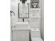 Well-lit bathroom featuring a modern vanity, square sink, updated fixtures, and a sleek mirror at 3009 E Whitton Ave, Phoenix, AZ 85016