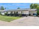 Well-maintained home showcasing a neat front lawn, attached garage, and inviting curb appeal at 3009 E Whitton Ave, Phoenix, AZ 85016