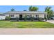 Charming single-story home featuring a landscaped front yard and a welcoming entrance at 3009 E Whitton Ave, Phoenix, AZ 85016
