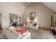Spacious living room with neutral décor, high ceilings, tile floors, and plenty of natural light at 3033 E Claremont Ave, Phoenix, AZ 85016