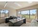 Bright office boasts a large window, providing ample natural light and golf course views at 3033 E Claremont Ave, Phoenix, AZ 85016
