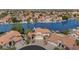 Waterfront property with mature landscaping, and tile roof at 3112 N 110Th Ave, Avondale, AZ 85392