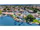 Aerial view of a luxurious waterfront home with a pool and boat dock at 3112 N 110Th Ave, Avondale, AZ 85392