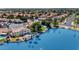 Aerial view showcasing a waterfront home with a pool and well-manicured lawn at 3112 N 110Th Ave, Avondale, AZ 85392