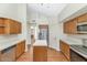 Bright kitchen with stainless steel appliances, light countertops, and wood cabinets at 3112 N 110Th Ave, Avondale, AZ 85392