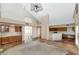 Bright and airy living space featuring open access to kitchen, high ceilings, and tile flooring at 3112 N 110Th Ave, Avondale, AZ 85392