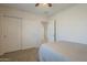 Bedroom with closet doors and a bedroom view at 3247 N Loma Vis, Mesa, AZ 85213