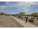 Community park with a paved pathway, landscaping, and residential views at 3247 N Loma Vis, Mesa, AZ 85213