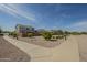 Well-maintained community park area near homes with a paved walkway at 3247 N Loma Vis, Mesa, AZ 85213