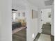 Stylish bedroom with gray wood floors and large windows providing natural light at 3401 N 37 St # 14, Phoenix, AZ 85018