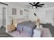 Nicely decorated bedroom with modern decor, a ceiling fan, and natural light at 3401 N 37 St # 14, Phoenix, AZ 85018