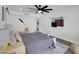 Bedroom featuring a ceiling fan, stylish decor, a large bed, and ample light at 3401 N 37 St # 14, Phoenix, AZ 85018