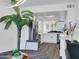 Modern kitchen featuring white cabinets, stainless steel appliances, and an island with a breakfast bar at 3401 N 37 St # 14, Phoenix, AZ 85018