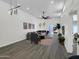 Bright living room with modern furniture, a ceiling fan, and seamless flooring at 3401 N 37 St # 14, Phoenix, AZ 85018