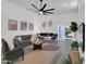 Spacious living room with a comfortable seating arrangement, modern decor, and natural light at 3401 N 37 St # 14, Phoenix, AZ 85018