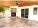 Entertain on the covered back patio with fireplace and tongue and groove ceiling at 3514 W Altadena Ave, Phoenix, AZ 85029