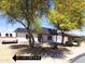 A bright home with an RV gate driveway, desert landscaping, and a well-maintained exterior at 3514 W Altadena Ave, Phoenix, AZ 85029