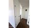 Hallway with hard wood floors and white walls and white doors at 3514 W Altadena Ave, Phoenix, AZ 85029