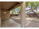 Covered back patio, view of backyard with gravel and stone pavers at 3552 E Carla Vista Dr, Gilbert, AZ 85295