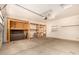 Bright garage with storage shelves and an open layout at 3552 E Carla Vista Dr, Gilbert, AZ 85295