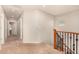 Hallway upstairs, carpeted and showing wood banister at 3552 E Carla Vista Dr, Gilbert, AZ 85295