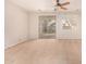 Light-filled living room with sliding glass door that leads to the backyard at 3552 E Carla Vista Dr, Gilbert, AZ 85295