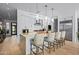 Modern kitchen with island, pendant lighting, stainless steel appliances and a view to entry hall at 37200 N Cave Creek Rd # 1122, Scottsdale, AZ 85262