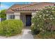 Covered porch with desert landscaping and view of the front door and window at 4031 N Ranier --, Mesa, AZ 85215