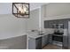 Modern kitchen with stainless steel appliances and quartz countertops at 4031 N Ranier --, Mesa, AZ 85215
