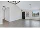 Spacious open living room with neutral paint, tile flooring, and views of multiple windows at 4031 N Ranier --, Mesa, AZ 85215