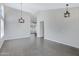 Spacious living room features tile floors, high ceilings and modern lighting at 4031 N Ranier --, Mesa, AZ 85215