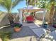 Relaxing backyard patio featuring a covered gazebo with seating and lush landscaping at 4525 E Desert View Dr, Phoenix, AZ 85044