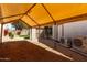 Spacious covered carport area with storage and easy access to the house and backyard at 4525 E Desert View Dr, Phoenix, AZ 85044