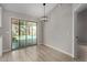 Bright dining area with sliding glass doors to backyard pool at 4525 E Desert View Dr, Phoenix, AZ 85044