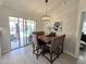 Elegant dining area with stylish lighting and a view of the outdoor pool, perfect for entertaining at 4525 E Desert View Dr, Phoenix, AZ 85044