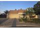 Charming single-story home with a well-maintained front yard and a two-car garage at 4525 E Desert View Dr, Phoenix, AZ 85044