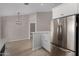 Kitchen with stainless steel appliances and adjacent dining area at 4525 E Desert View Dr, Phoenix, AZ 85044