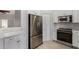 Updated kitchen with stainless steel appliances and storage at 4525 E Desert View Dr, Phoenix, AZ 85044