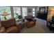Bright living room with stylish decor, comfortable seating, and large windows at 4525 E Desert View Dr, Phoenix, AZ 85044