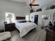 Comfortable main bedroom with vaulted ceilings, a ceiling fan, and neutral decor at 4525 E Desert View Dr, Phoenix, AZ 85044